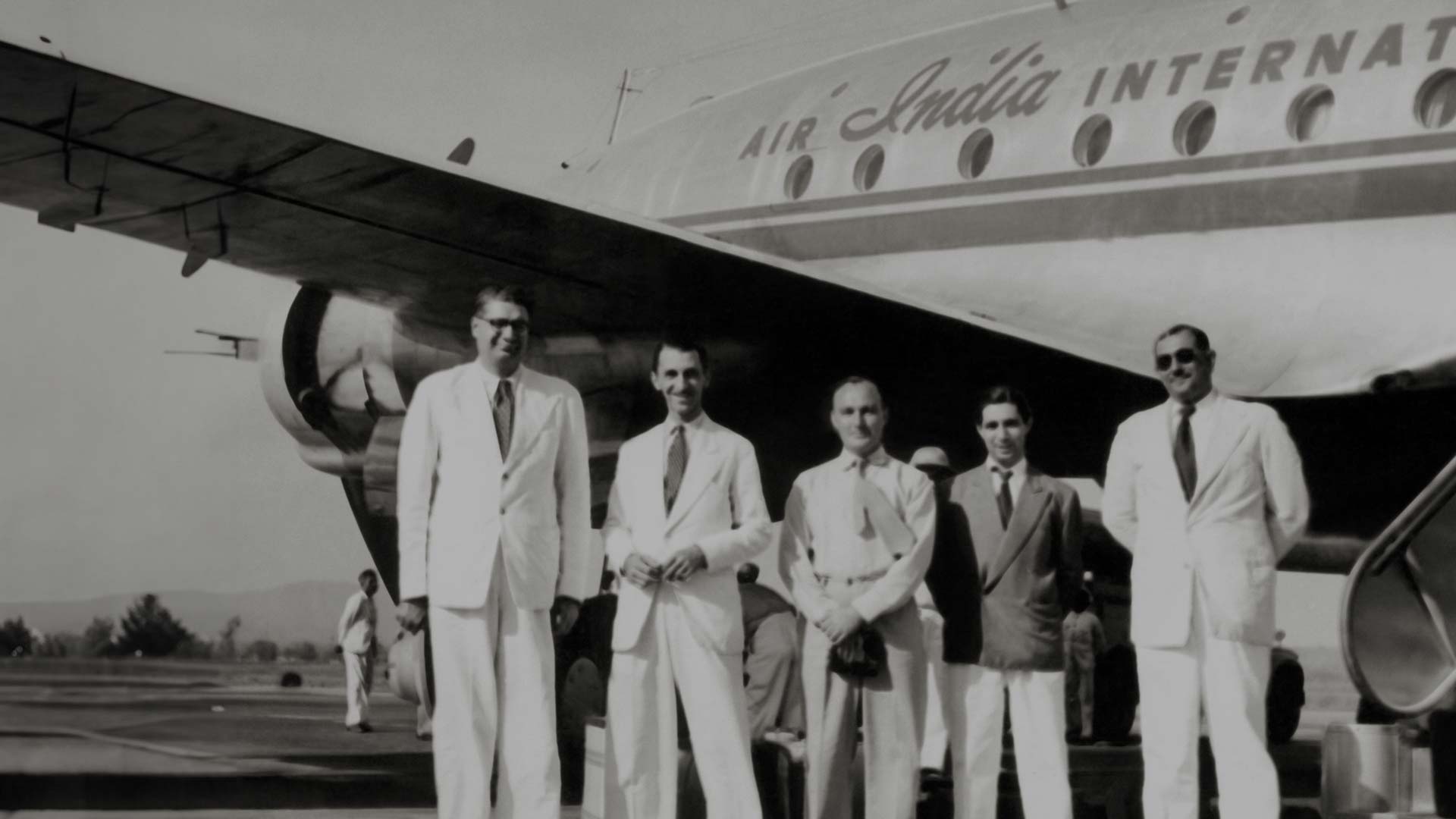 JRD Tata and colleagues after the arrival of the inaugural DEL-BOM flight in 1948