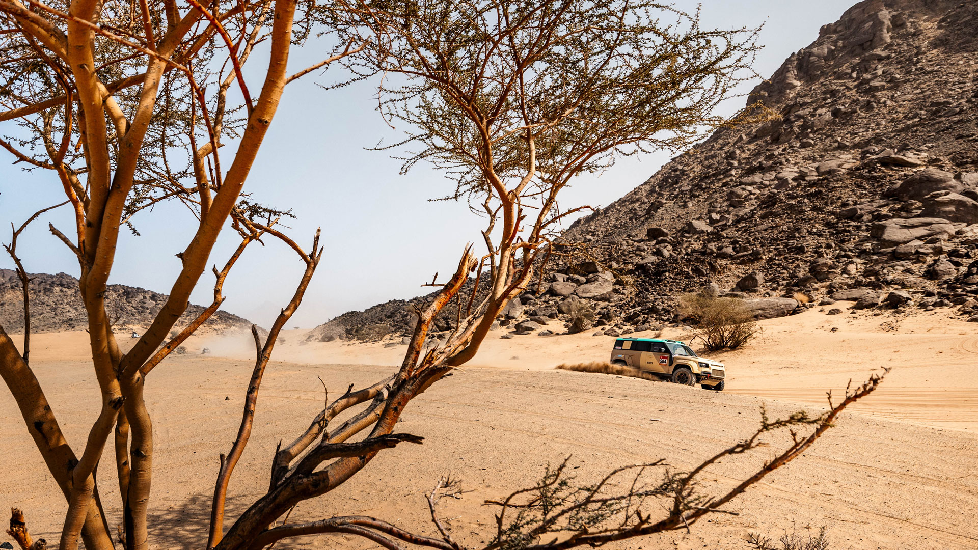 Sara Price in rocky terrain