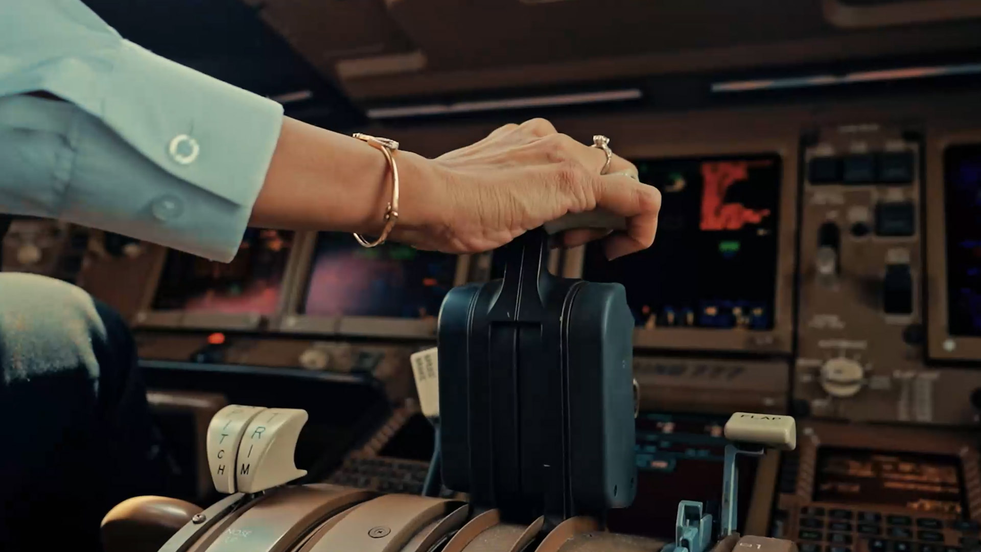 A pilot's hand on the throttle